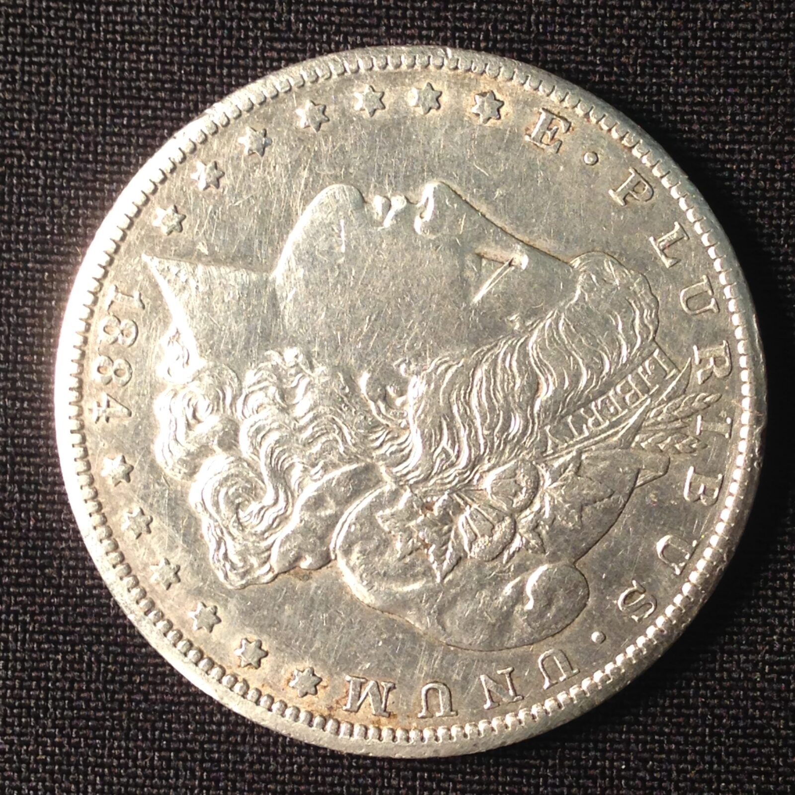 1884-CC Morgan Dollar AU