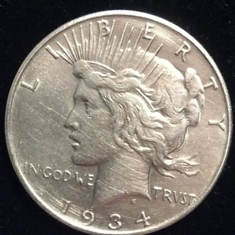 1934 Peace Silver Dollar in AU50 Almost Uncirculated Condition