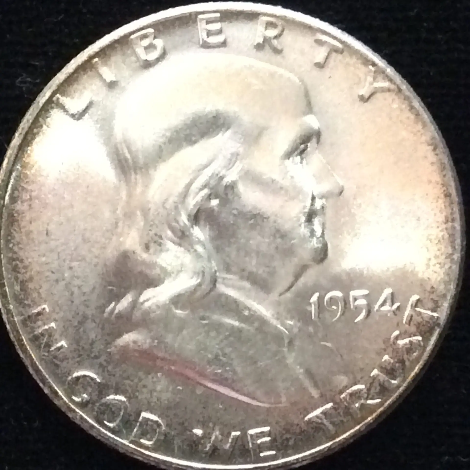 1954 Franklin Half Dollar in GEM MS65 Condition