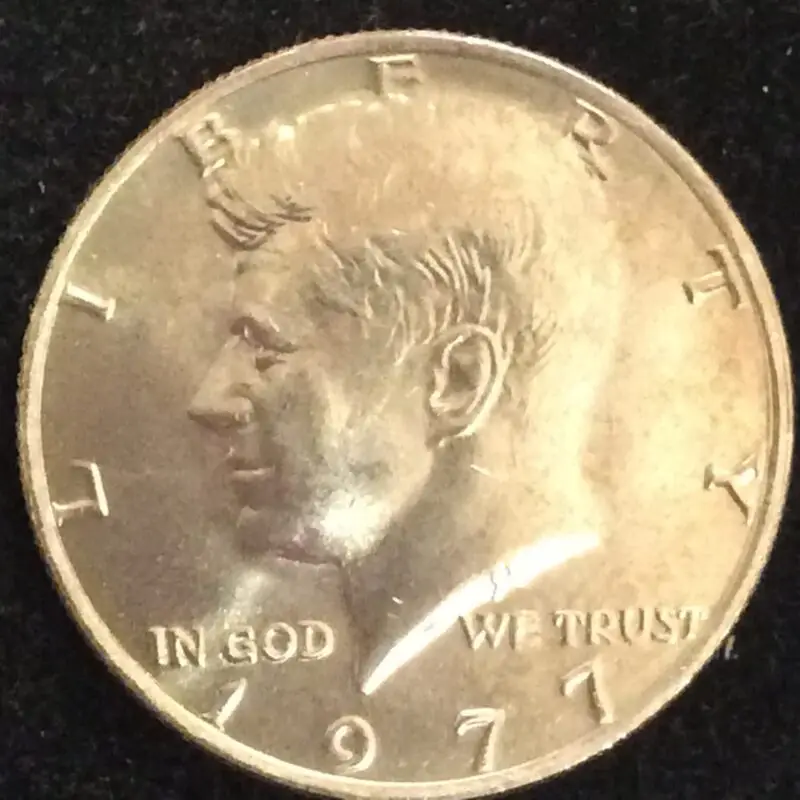 1977 Kennedy Half Dollar in GEM BU MS65 Condition