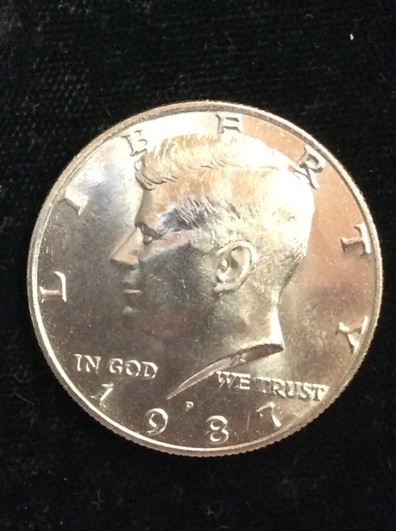 1987-P Kennedy Half Dollar in Gem BU MS65 Condition