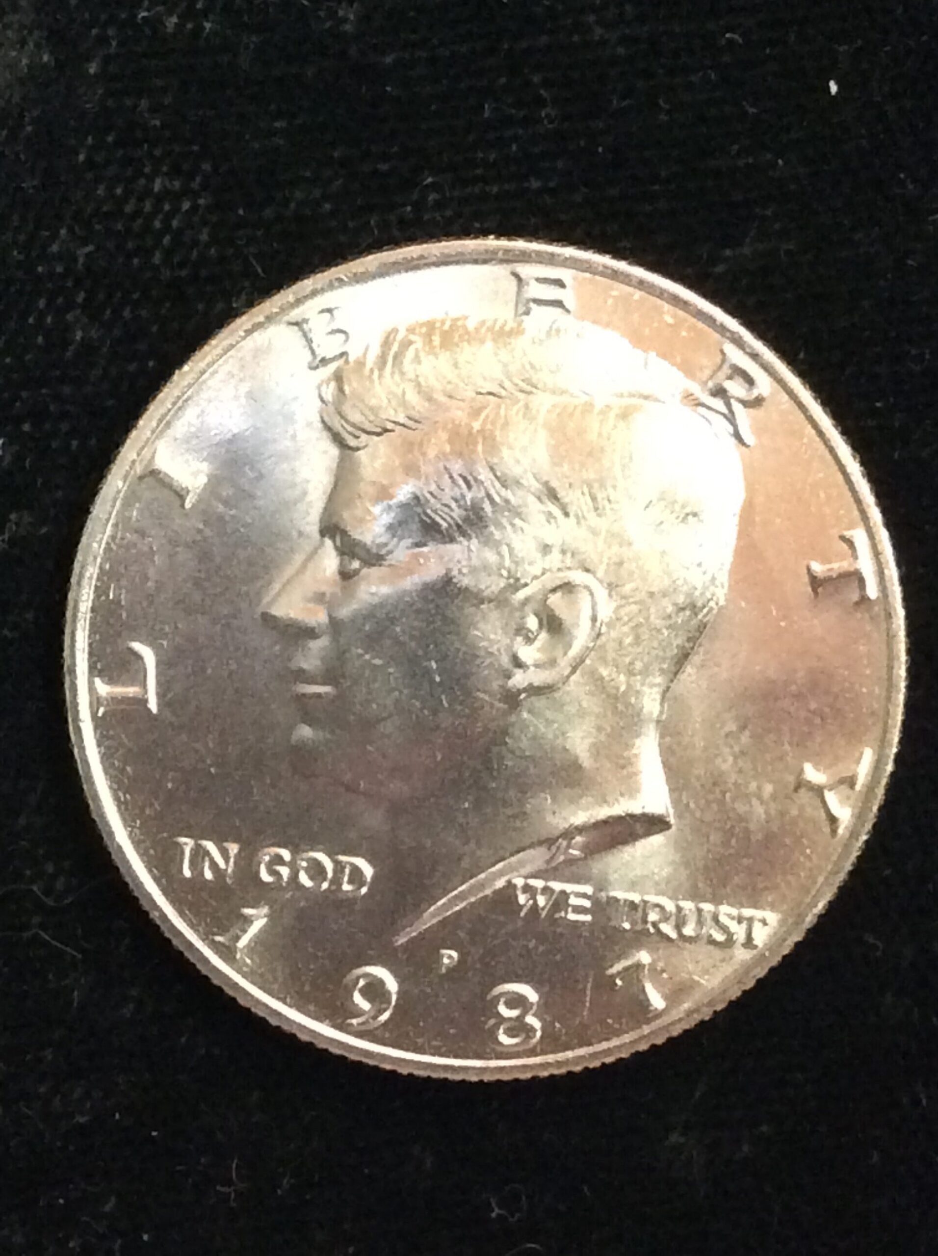 1987-P Kennedy Half Dollar in Gem BU MS65 Condition
