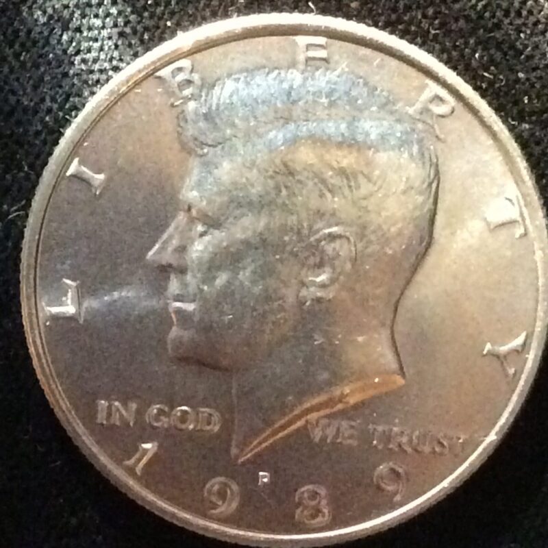 1989-P Kennedy Half Dollar in GEM BU MS65 Condition