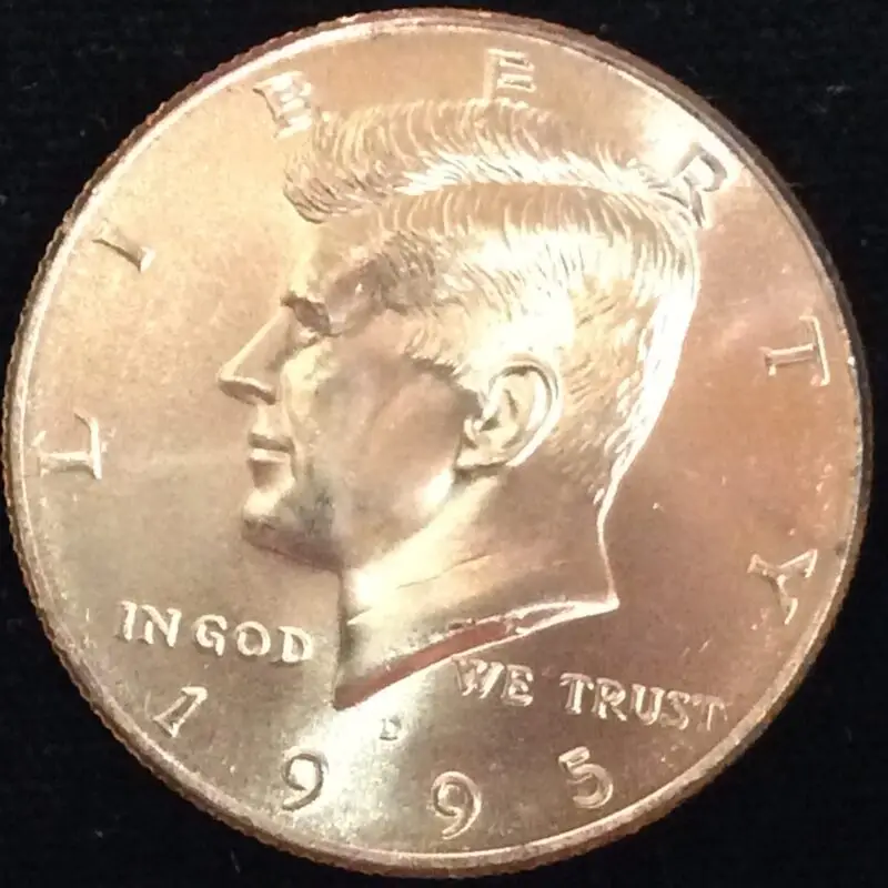 1995-D Kennedy Half Dollar in GEM BU MS65 Condition