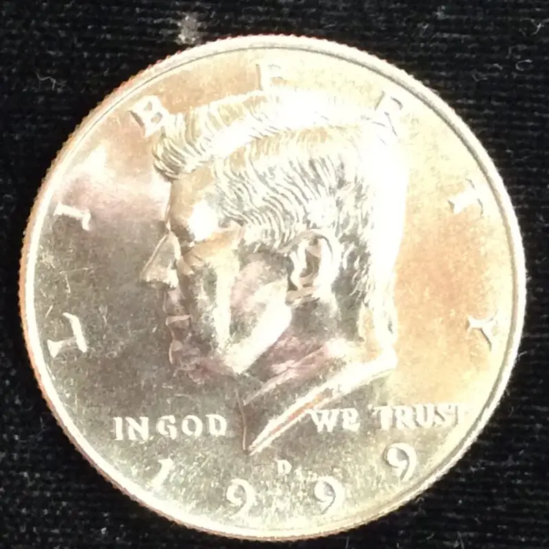 1999-D Kennedy Half Dollar in GEM BU MS65 Condition