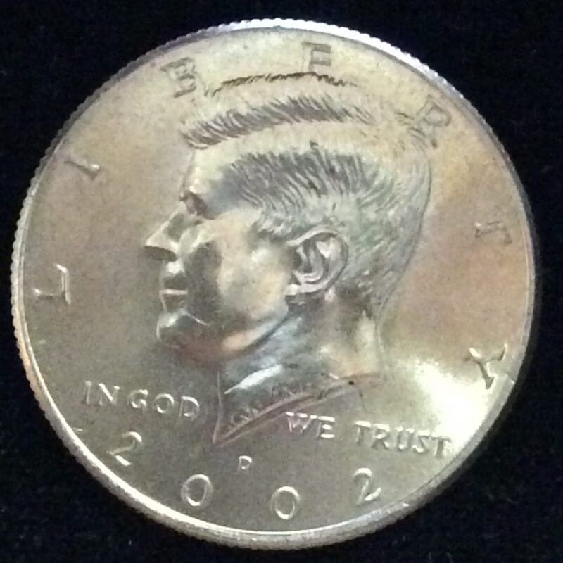 2002-D Kennedy Half Dollar in GEM BU MS65 Condition