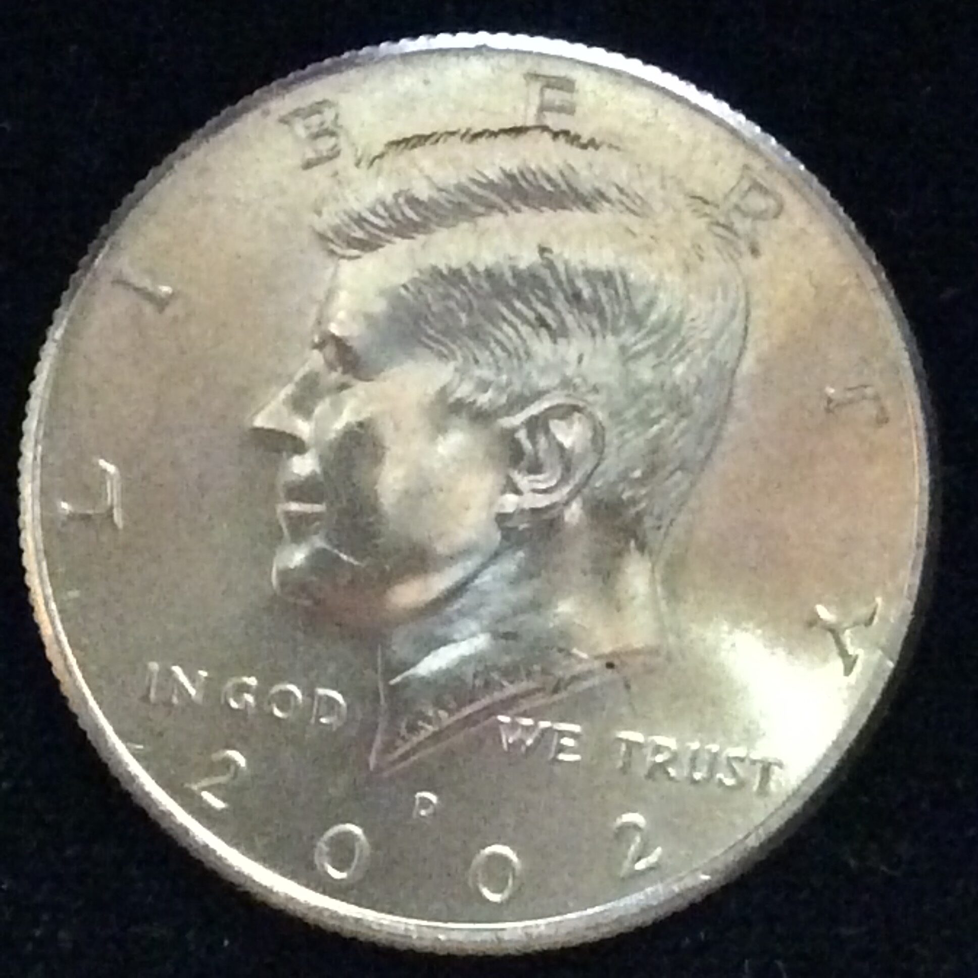 2002-D Kennedy Half Dollar in GEM BU MS65 Condition